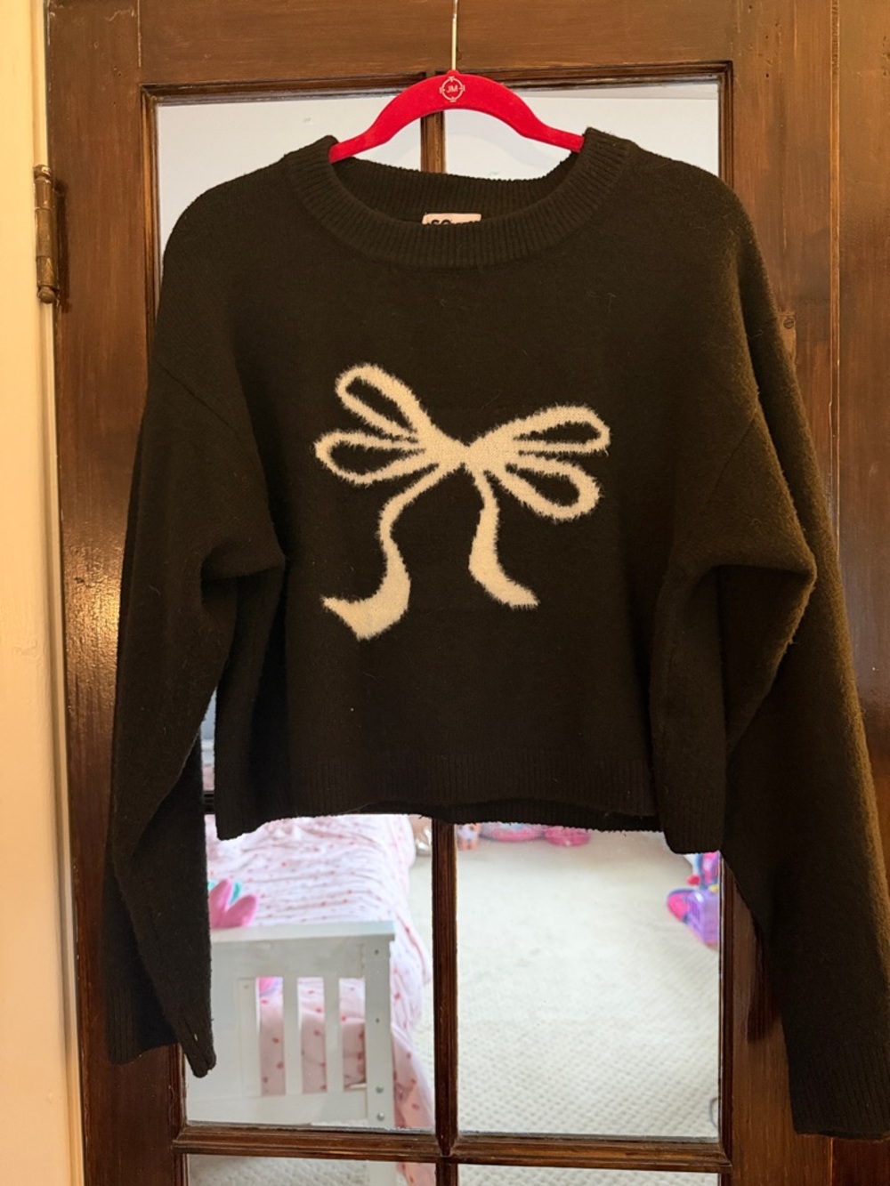 SO Black Crewneck Sweater with Cream Bow Graphic